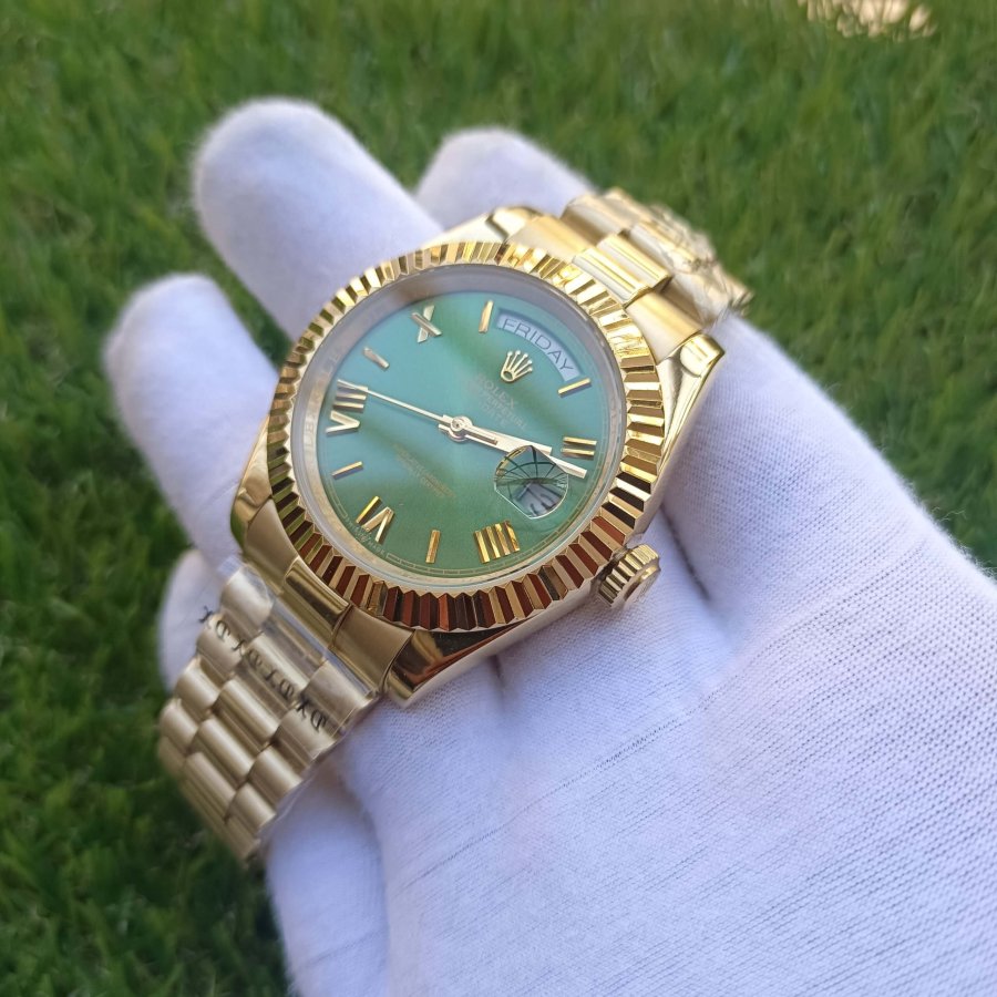 rolex day date 40 rose gold green dial