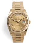 rolex day date 40 yellow gold champagne dial watch